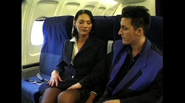 أفضل مقاطع الطاقة Brunette beauty wearing stewardess uniform gets fucked on a plane