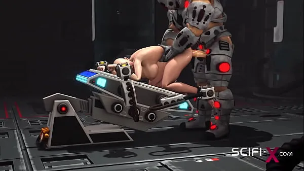 Beste Sci-fi male sex cyborg plays with a sexy young hottie in restraints in the lab strømklipp